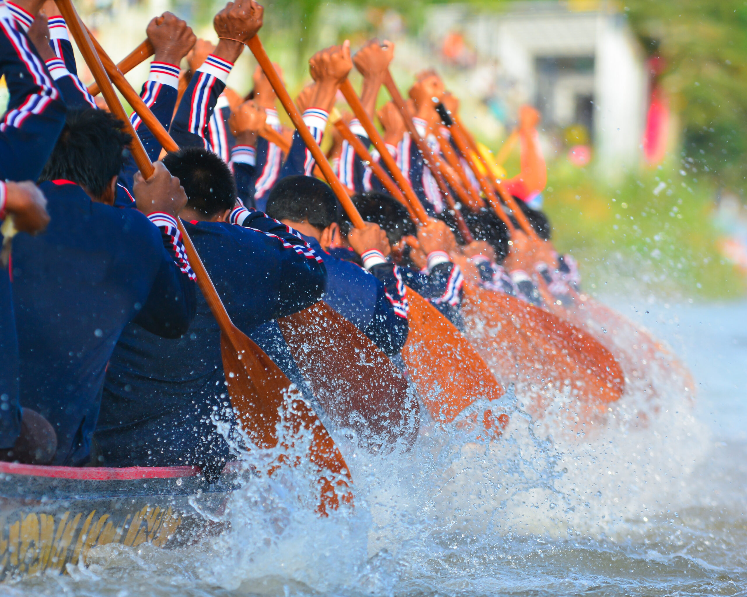 men rowing for teams